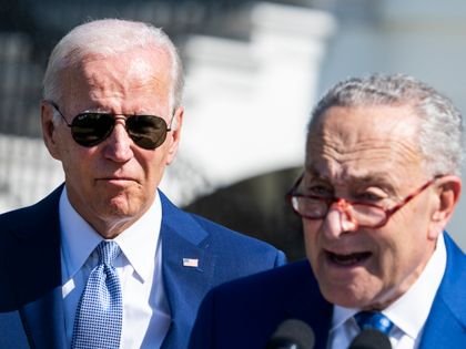Senate Majority Leader Charles Schumer, D-N.Y., and President Joe Biden, are seen during The CHIPS and Science Act of 2022 bill signing on the South Lawn of the White House, which provides funding for the semiconductor industry, on Tuesday, August 9, 2022. (Tom Williams/CQ-Roll Call, Inc via Getty Images)