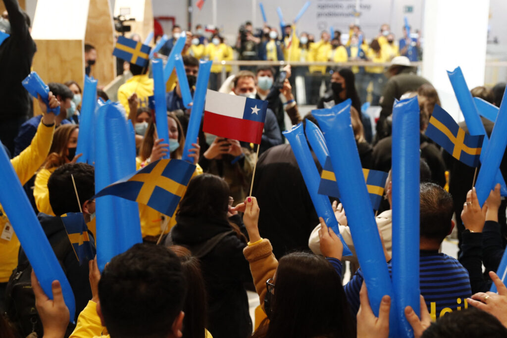 Workers welcome visitors to the newly inaugurated IKEA store in Santiago, on August 10, 2022. - Swedish furniture and home furnishings retailer Ikea opened its first shop in South America in Santiago de Chile on Wednesday, the start of its announced expansion into the region. (Photo by JAVIER TORRES / AFP) (Photo by JAVIER TORRES/AFP via Getty Images)