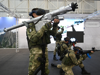 Russia servicemen display devises combating drones at the Army-2022 International Military