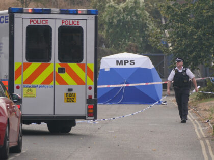 A police tent at the scene in Cayton Road, Greenford, in west London, where an elderly man