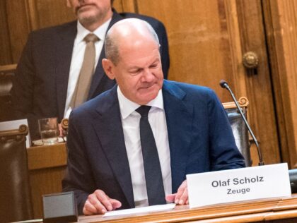 German Chancellor Olaf Scholz (R) appears before the Parliamentary Investigation Committee on the CumEx Tax Money Affair, as German government's spokesman Steffen Hebestreit (L) looks on, at the city hall in Hamburg, northern Germany, on August 19, 2022. (Photo by Daniel Bockwoldt / AFP) (Photo by DANIEL BOCKWOLDT/AFP via Getty …