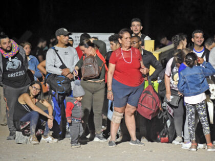 SAN LUIS, AZ - August 20: Migrants attempting to cross in to the U.S. from Mexico are deta
