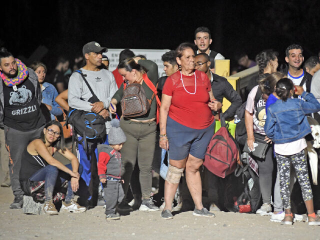 SAN LUIS, AZ - August 20: Migrants attempting to cross in to the U.S. from Mexico are detained by U.S. Customs and Border Protection at the border August 20, 2022 in San Luis, Arizona. (Photo by Nick Ut/Getty Images)