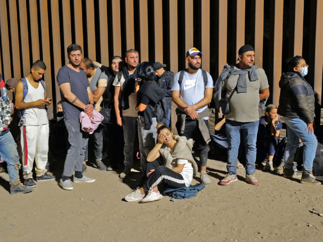 SAN LUIS, AZ - August 20: Migrants attempting to cross in to the U.S. from Mexico are detained by U.S. Customs and Border Protection at the border August 20, 2022 in San Luis, Arizona. (Photo by Nick Ut/Getty Images)