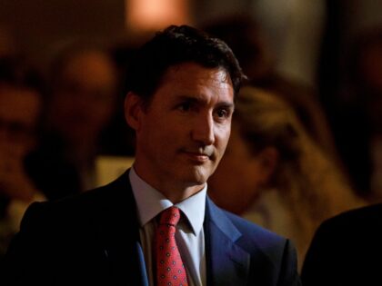 Canada's Prime Minister Justin Trudeau attends a welcome dinner for German Chancellor Olaf Scholz at the Royal Ontario Museum in Toronto, Ontario, Canada, on August 22, 2022. - German Chancellor Olaf Scholz on August 22, 2022 met with Prime Minister Justin Trudeau in Canada to firm up access to new …