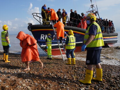 A group of people thought to be migrants are brought in to Dungeness, Kent, onboard an RNLI Lifeboat following a small boat incident in the Channel. Picture date: Saturday August 27, 2022. (Photo by Gareth Fuller/PA Images via Getty Images)