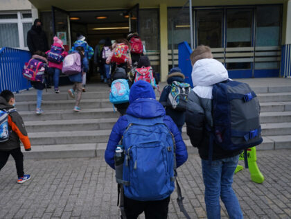 BERLIN, GERMANY - MARCH 09: Children arrive for in-person classes at the GutsMuths elementary school during the coronavirus pandemic on March 09, 2021 in Berlin, Germany. As of today 4th through 6th graders are returning to classes in Berlin, following the 1st through 3rd graders that were allowed to return …