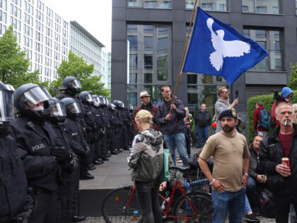 BERLIN, GERMANY - MAY 22: Participants confront riot police at a gathering of several hundred Querdenker coronavirus skeptics in the city center who were there despite a court-issued ban on planned, large-scale demonstrations for the weekend on May 22, 2021 in Berlin, Germany. Protest gatherings with 16,000 participants each were …