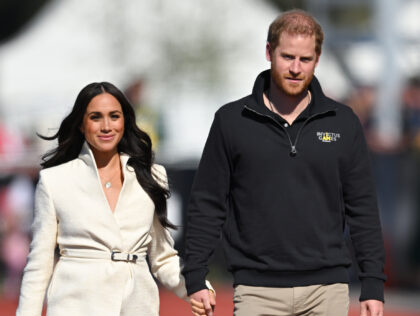 THE HAGUE, NETHERLANDS - APRIL 17: Prince Harry, Duke of Sussex and Meghan, Duchess of Sussex attend the athletics event during the Invictus Games at Zuiderpark on April 17, 2022 in The Hague, Netherlands. (Photo by Karwai Tang/WireImage)
