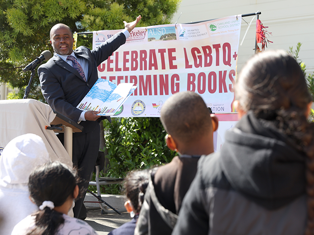 California State Superintendent of Schools Tony Thurmond reads from the book "Red: A Crayo