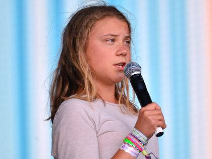 GLASTONBURY, ENGLAND - JUNE 25: Climate activist Greta Thunberg speaks on the Pyramid stage during day four of Glastonbury Festival at Worthy Farm, Pilton on June 25, 2022 in Glastonbury, England. The 50th anniversary of Glastonbury’s inaugural event in 1970 was postponed twice after two cancelled events, in 2020 and …