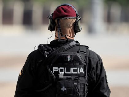 MADRID, SPAIN - JULY 15: A policeman stands guard at the third State tribute to the victim