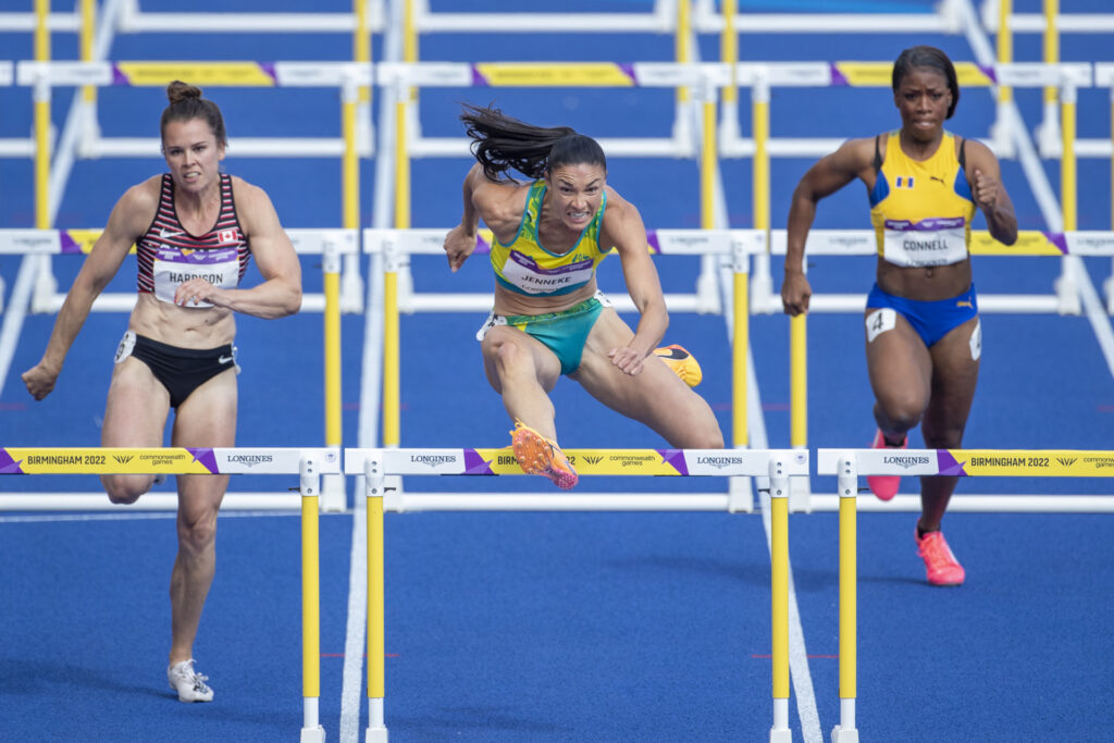 Michelle Jenneke of Australia finishing in second place and Michelle Harrison of Canada finishing in third place in the Women's 100m Hurdles - Round 1 - Heat 3 during the Athletics competition at Alexander Stadium during the Birmingham 2022 Commonwealth Games on August 5, 2022, in Birmingham, England. (Photo by Tim Clayton/Corbis via Getty Images)