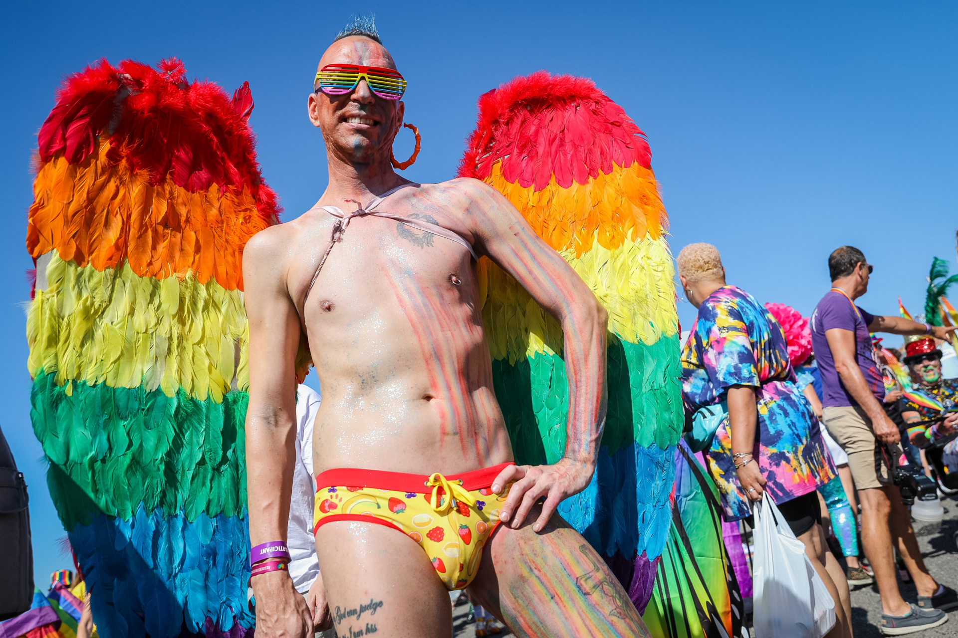 Brighton, UK - August 6: A festival goer poses at the Pride LGBTQ+ Community Parade - 'Love, Protest and Unity' during Brighton Pride on August 6, 2022 in Brighton, UK posture.  (Photo by Tristan Fiennes/Getty Images)