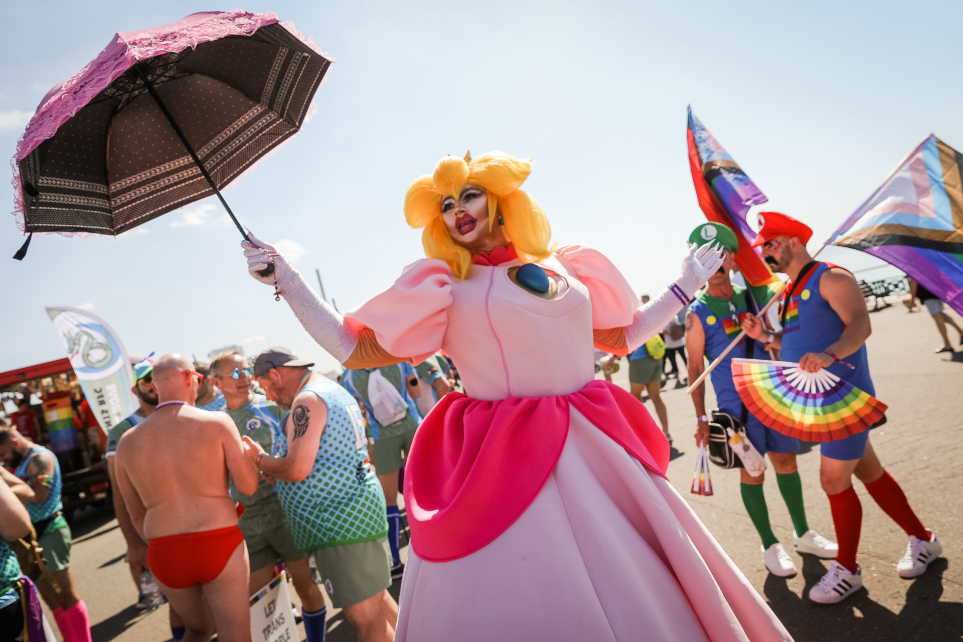 BRIGHTON, ENGLAND - AUGUST 06: Festival goers take part in the Pride LGBTQ+ Community Parade – 'Love, Protest & Unity' during Brighton Pride on August 6, 2022 in Brighton, England.  (Photo by Tristan Fewings/Getty Images)