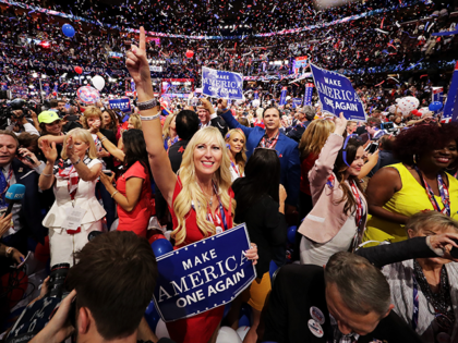 Delegates stand and cheer at the end of the Republican National Convention on July 21, 201