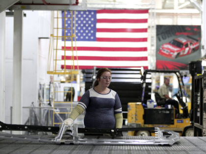 STERLING HEIGHTS, MI - AUGUST 26: A worker handle parts for Fiat Chrysler Automobiles as