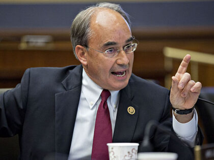 Representative Bruce Poliquin, a Republican from Maine, questions John Stumpf, chief executive officer of Wells Fargo & Co., not pictured, during a House Financial Services Committee hearing in Washington, D.C., U.S., on Thursday, Sept. 29, 2016. Stumpf, fighting to keep his job amid a national political furor, will forgo more …