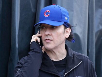 John Cusack stands outside Wrigley Field in Game Three of the 2016 World Series between the Chicago Cubs and the Cleveland Indians at Wrigley Field on October 28, 2016 in Chicago, Illinois. (Photo by Jamie Squire/Getty Images)