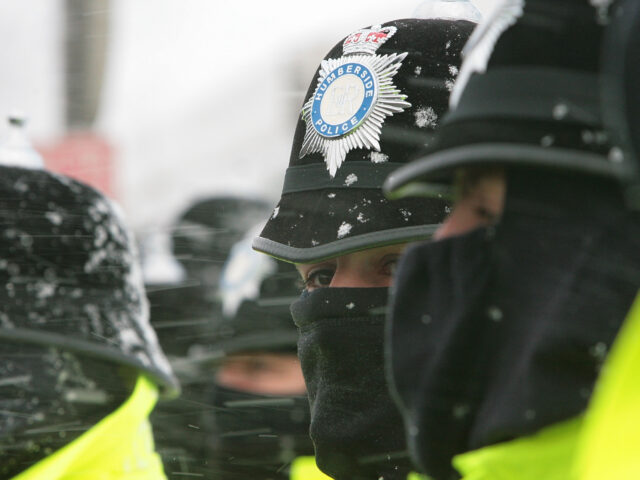IMMINGHAM, UNITED KINGDOM - FEBRUARY 02: Police officers guarding the Lindsey oil refinery