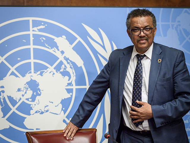 World Health Organization (WHO) Director General Tedros Adhanom Ghebreyesus arrives for a press conference following an International Health Regulations Emergency Committee on an Ebola outbreak in Democratic Republic of Congo on May 18, 2018 at the United Nations Office in Geneva. (Photo by Fabrice COFFRINI / AFP) (Photo by FABRICE …