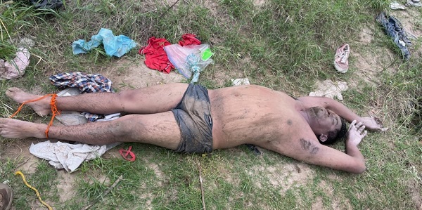 Agents recover the body of a drowned migrant near Eagle Pass -- the fifth in three days. (U.S. Border Patrol/Del Rio Sector)
