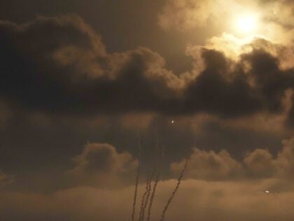 Israel's Iron Dome air defense system launches missiles to intercept rockets fired from the Gaza Strip toward Israel, over Gaza City, Friday, Aug. 5, 2022. Palestinian officials say Israeli airstrikes on Gaza have killed at least 10 people, including a senior militant, and wounded 55 others. (AP Photo/Adel Hana)