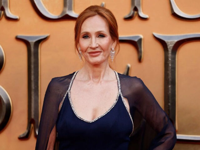 British writer J.K Rowling poses on the red carpet after arriving to attend the World Prem