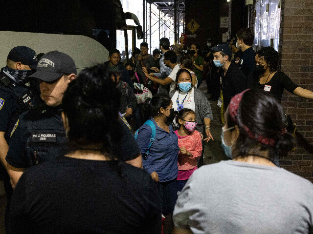 A bus carrying migrants from Texas arrives at Port Authority Bus Terminal on August 10, 20