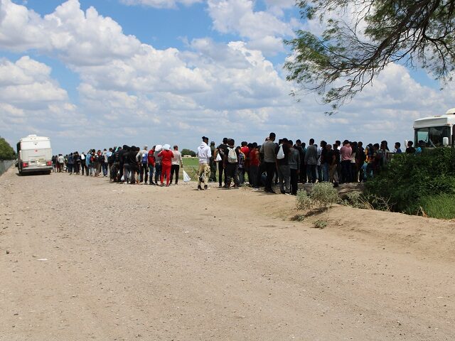 Exclusive Photos: 700 Migrants Cross in Five Hours at Texas Border Town