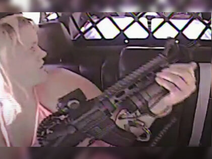 OK Woman slips out of handcuffs, grabs officer's AR-15, and opens fire.