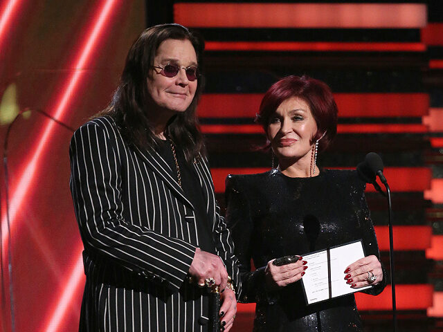Ozzy Osbourne, left, and Sharon Osbourne present the award for best rap/sung performance a