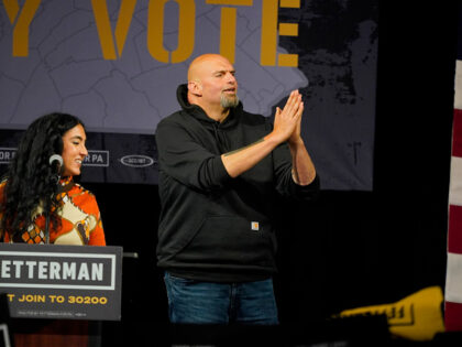 Pennsylvania Lt. Gov. John Fetterman, the Democratic nominee for the state's U.S. Senate seat, is introduced by wife Gisele Barre Fetterman, left, during a rally in Erie, Pa., on Friday, Aug. 12, 2022. (AP Photo/Gene J. Puskar)