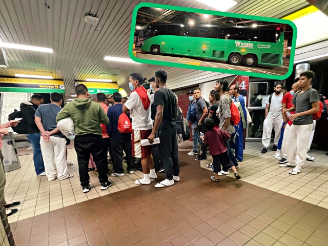 A bus filled with mostly single adult male migrants arrives in New York City from Texas as part of Gov. Greg Abbotts’ plan that buses border crossers and illegal aliens out of the state to Democrat-run cities. (Emma-Jo Morris/Breitbart News)