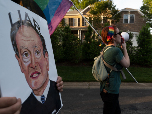 ALEXANDRIA, VA - JUNE 06: Abortion-rights advocates demonstrate outside the home of Justice Samuel A. Alito Jr. in Alexandria, VA on June 06, 2022. (Photo by Craig Hudson for The Washington Post via Getty Images)