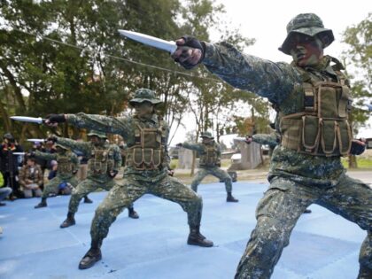Taiwan's "frogmen" Marines perform close combat drills just a few kilometers from mainland China on the outlying island of Kinmen, Taiwan, Tuesday, Jan. 26, 2016. Taiwan is holding small-scale military drills on an island it controls just off the Chinese coast. The head of Kinmen's defense command says the beach …