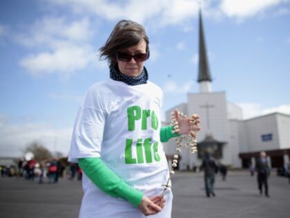 Ireland Prayer Vigil Diane Scanlan from the Pro Life group, who took part in a Rosary Procession at Knock Shrine, Ireland, Saturday, May 4, 2013, holds up her Rosary. The group Chooselife held a National Prayer Vigil for the right to life of mothers and babies during a service at …