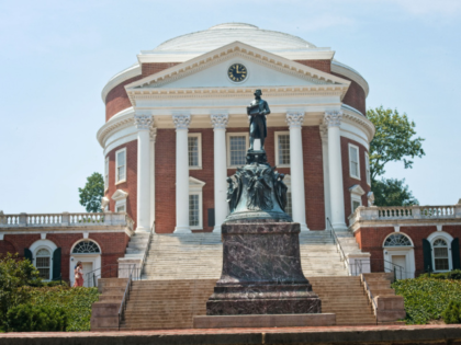 Statue of Thomas Jefferson in front of The Rotunda on the campus of the University of Virg