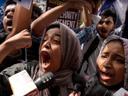 Muslim students shout anti-government slogans during a protest outside Uttar Pradesh house, in New Delhi, Monday, June 13, 2022. The students were protesting against persecution of Muslims and recent demolition of their houses following last week's protests against former Bharatiya Janata Party spokesperson Nupur Sharma's remark deemed derogatory to Islam's …