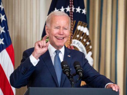 WASHINGTON, DC - AUGUST 16: President Joe Biden delivers remarks and signs H.R. 5376, the