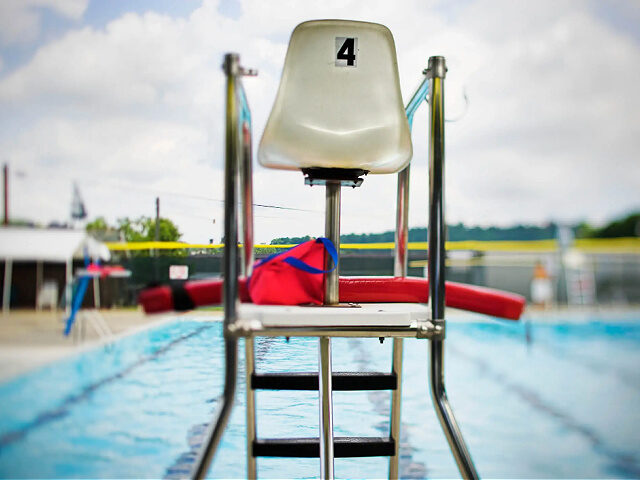Lifeguard Tower at Swimming Pool - stock photo