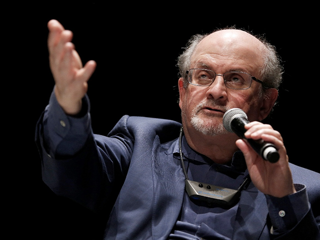 In this file photo taken on September 13, 2016, British writer Salman Rushdie speaks during the opening day of the Positive Economy Forum in Le Havre, northwestern France on September 13, 2016