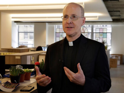 Father James Martin, a Jesuit priest and editor at large of America Magazine, is interviewed at the publication's offices, in New York, Monday, May 21, 2018. Pope Francis' reported comments to a gay man that "God made you like this" have been embraced by the LGBT community as another sign …