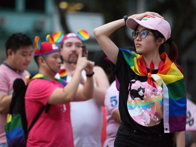 SINGAPORE, SINGAPORE - JUNE 29: Attendees decked in rainbow accessories can be seen during
