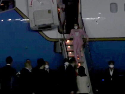A screen grab taken from a live handout video shows US House Speaker Nancy Pelosi landing