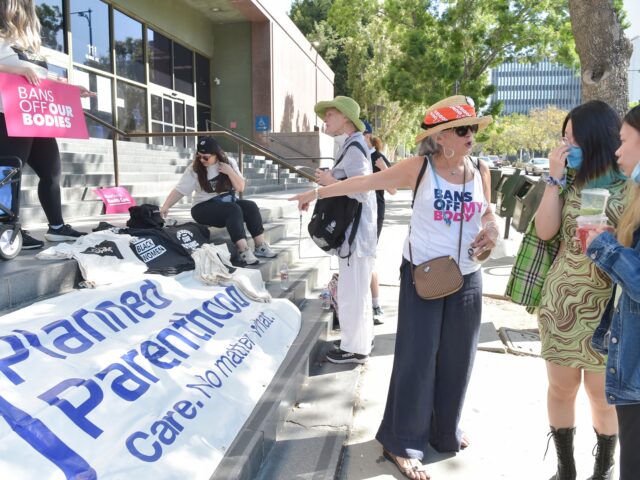 LOS ANGELES, CALIFORNIA - MAY 14: Representatives and volunteers from Planned Parenthood d