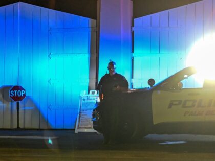 A police car is seen outside former US President Donald Trump's residence in Mar-A-La