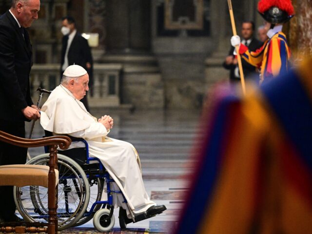 Pope Francis leaves in a wheelchair at the end of a funeral mass for late Slovakian Cardinal Jozef Tomko, on August 11, 2022 at St. Peter's Basilica in The Vatican. (Photo by Vincenzo PINTO / AFP) (Photo by VINCENZO PINTO/AFP via Getty Images)