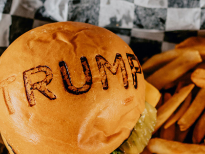 A burger joint named in honor of President Trump was founded by a Lebanese immigrant and draws large crowds.