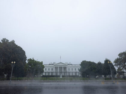 WASHINGTON, DC - AUGUST 16: Mist rises from a freshly paved road as it rains near the White House before U.S. President Joe Biden returns from Camp David on August 16, 2021 in Washington, DC. President Biden is expected to deliver remarks regarding the deteriorating situation in Afghanistan as its …